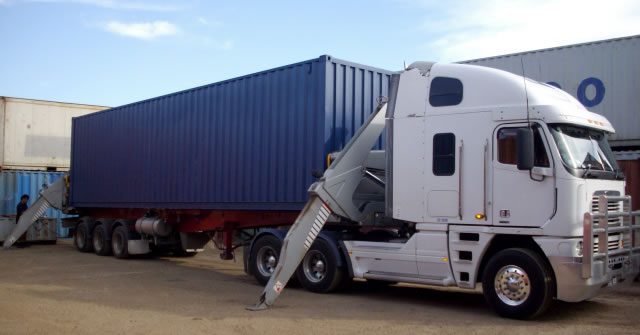 Transportation of 40ft Container on a Side Loader Truck
